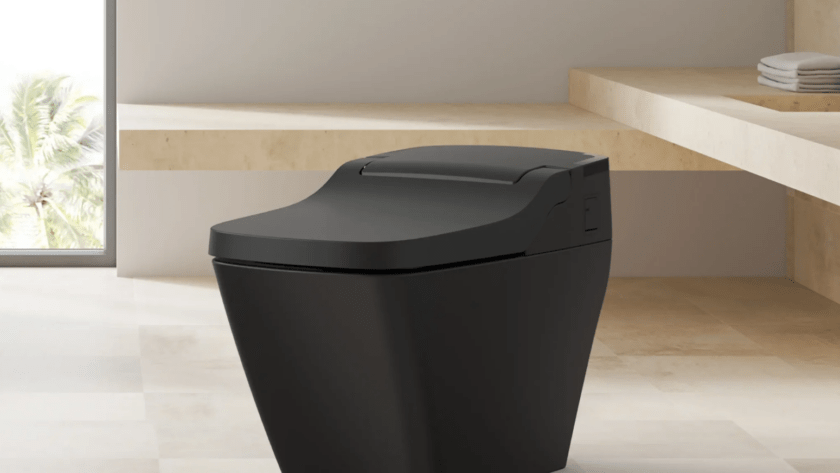 Modern black smart toilet in a sleek bathroom setting, showcasing contemporary design and luxury features, relevant to discussions on smart toilet brands like VOVO, KOHLER, and TOTO.